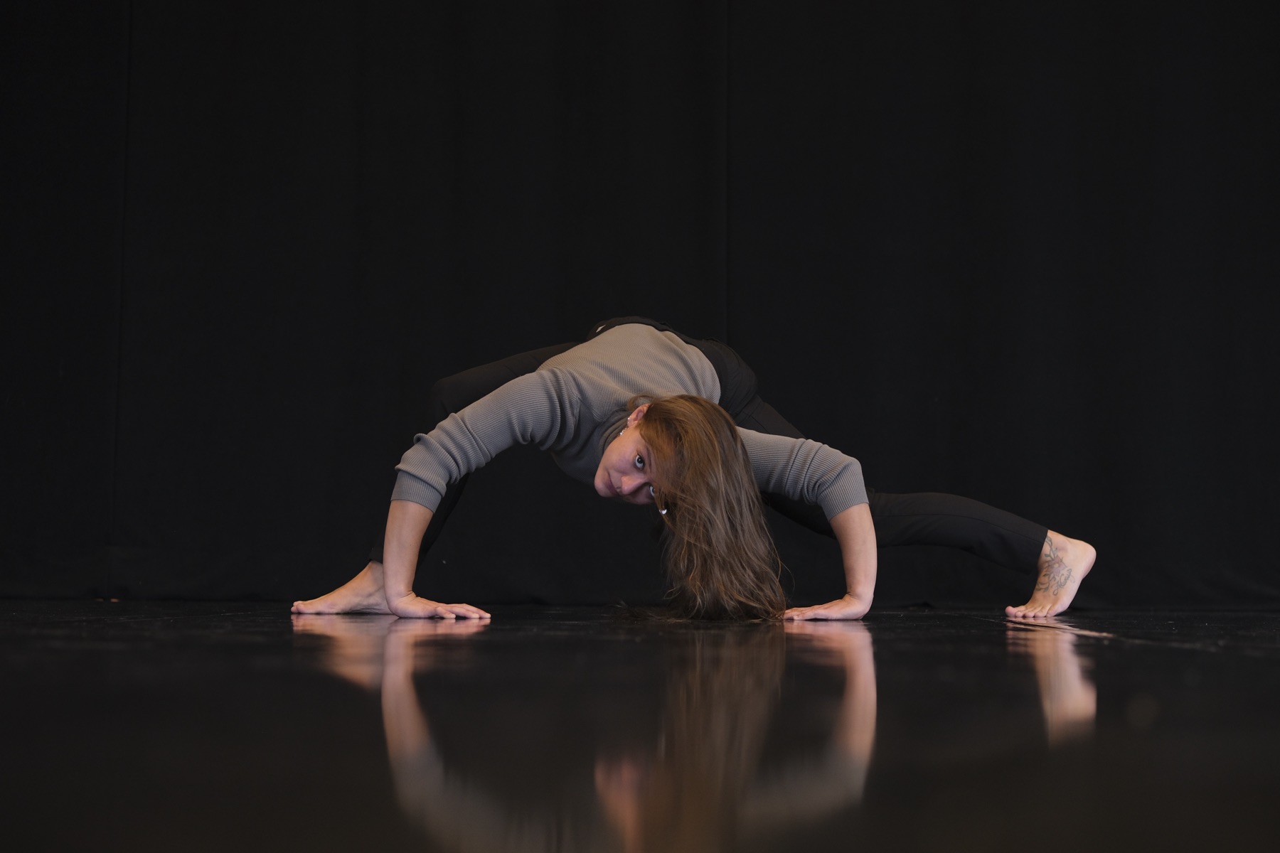 Floor figure, eyes to camera